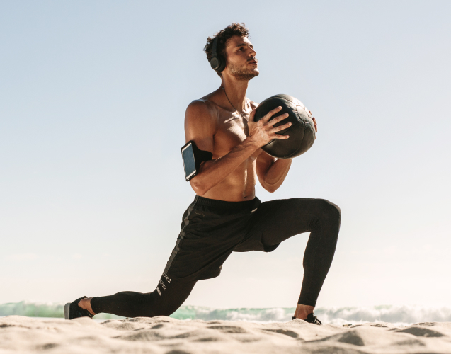 A photo of a man doing exercises with a ball.